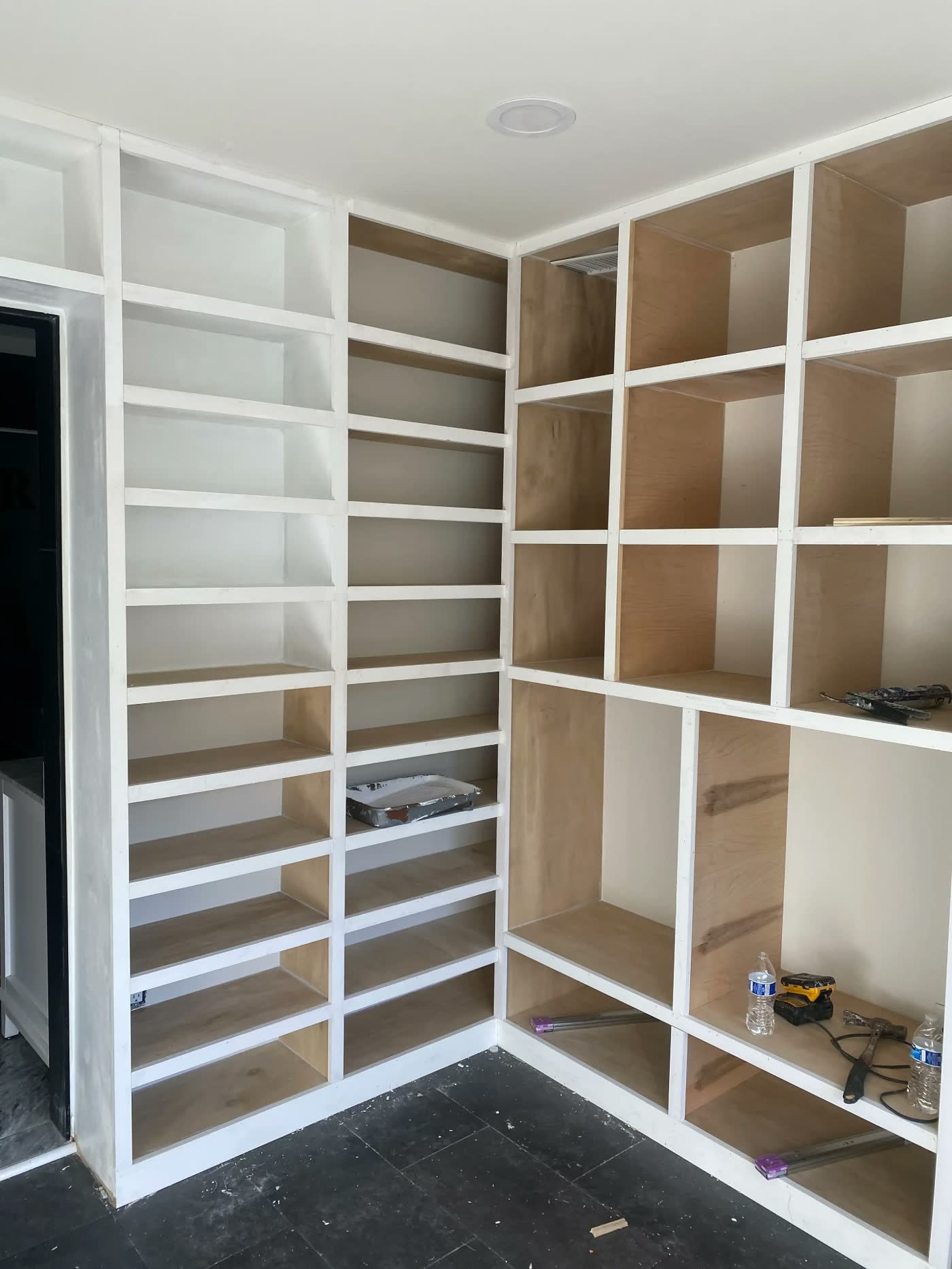 Custom closet shelving built and painted