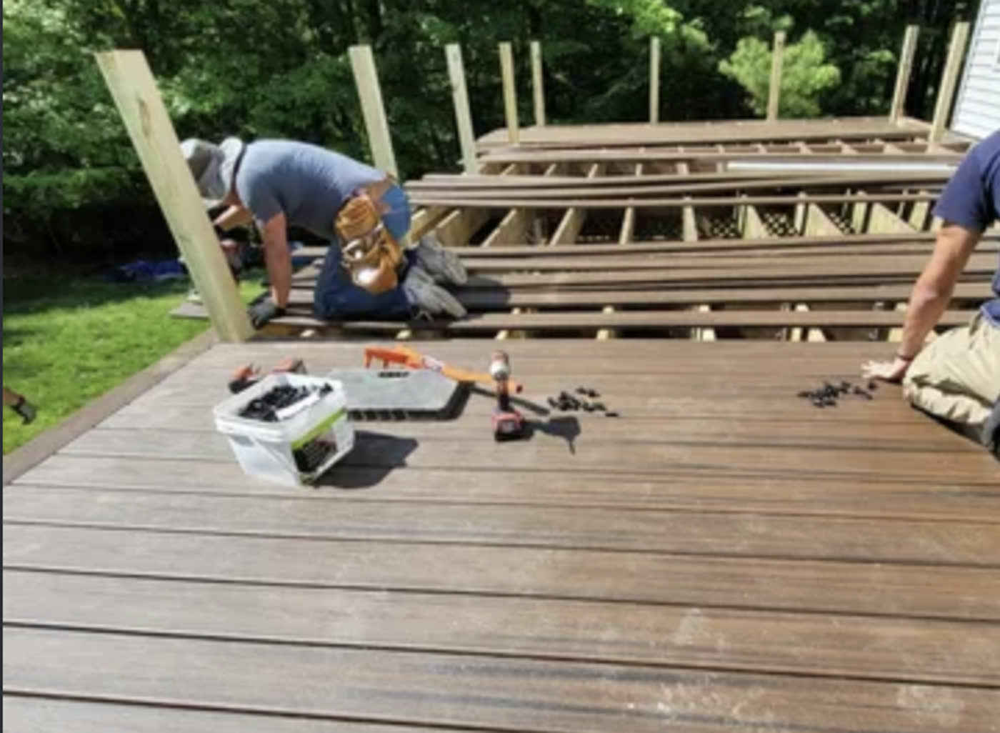 Deck boards going down over rebuilt framing