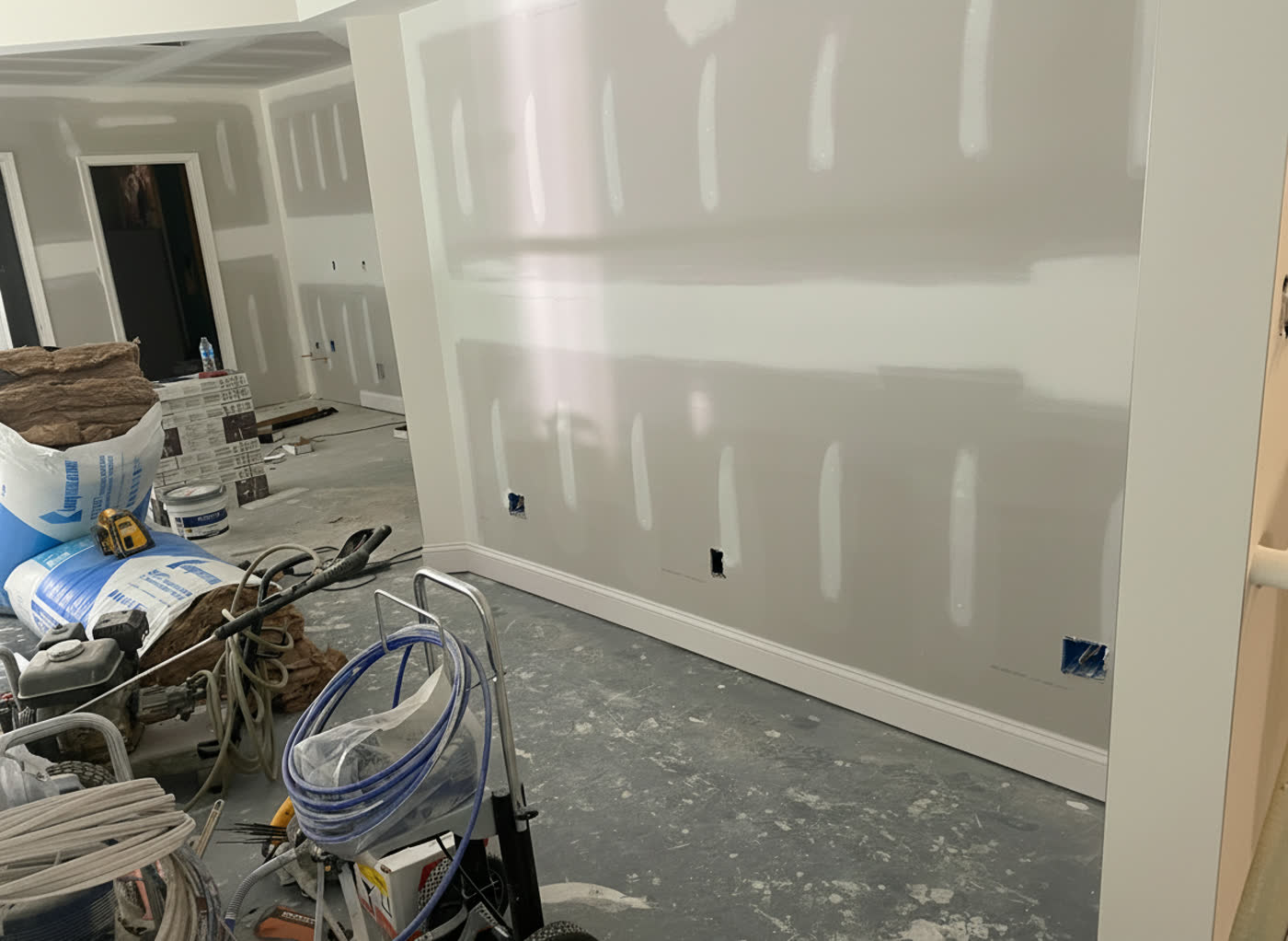 Drywall skim coated and sanded, ready for paint