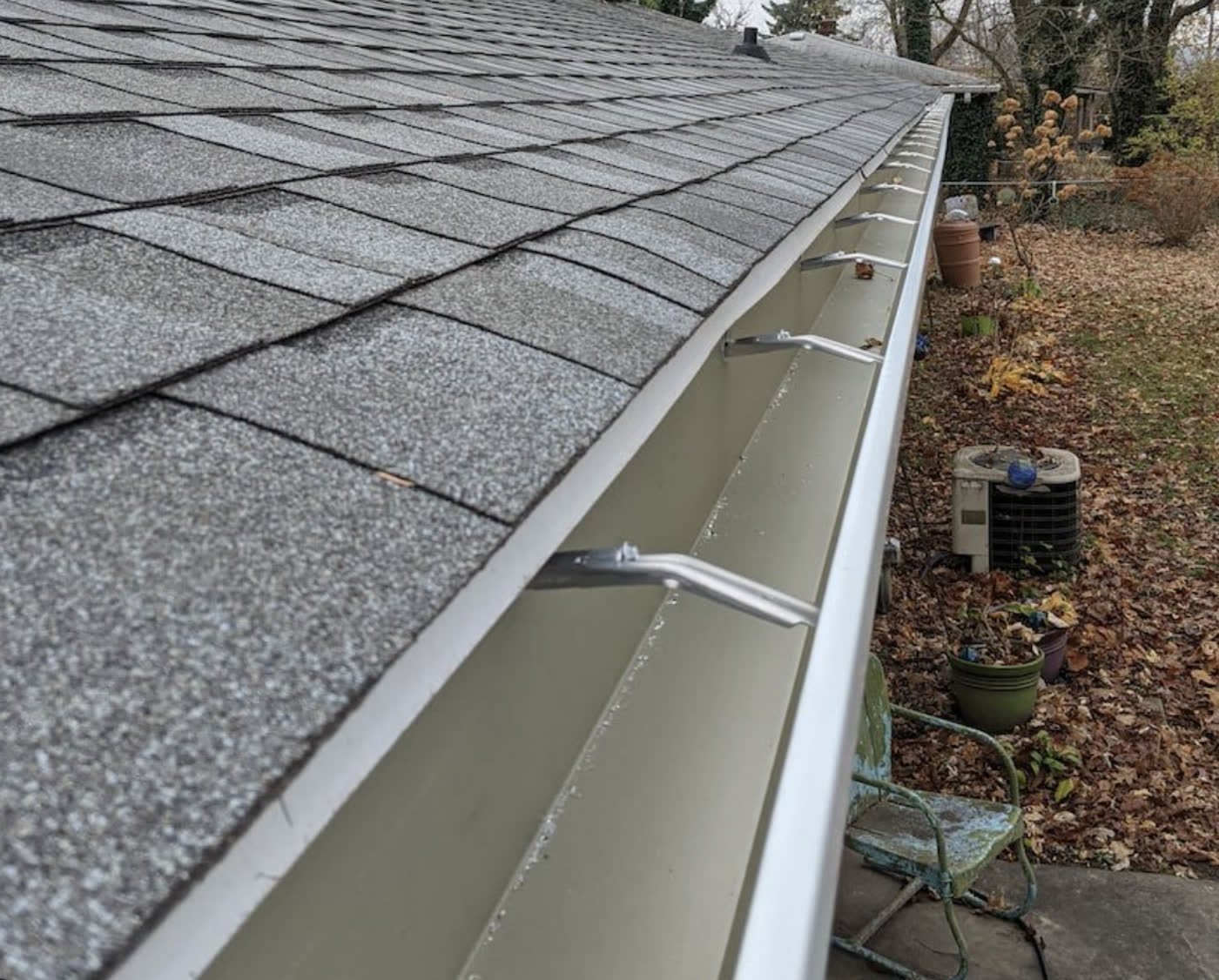 New seamless gutter run hung on fresh brackets