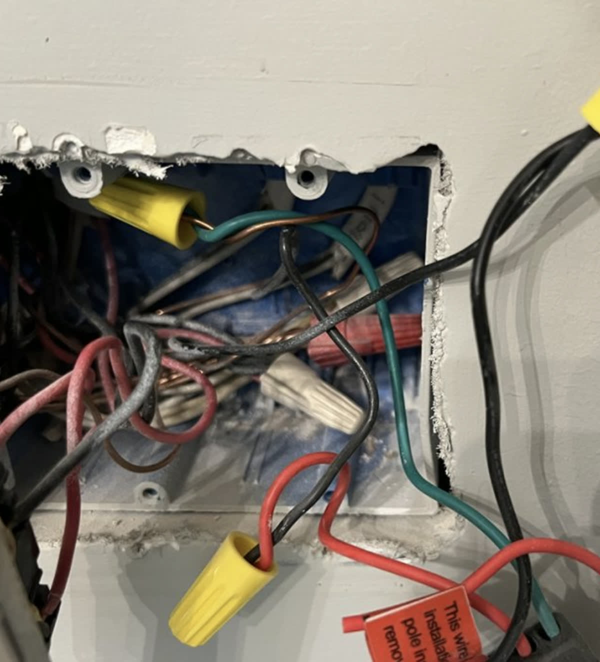Junction box wired and made safe behind the drywall